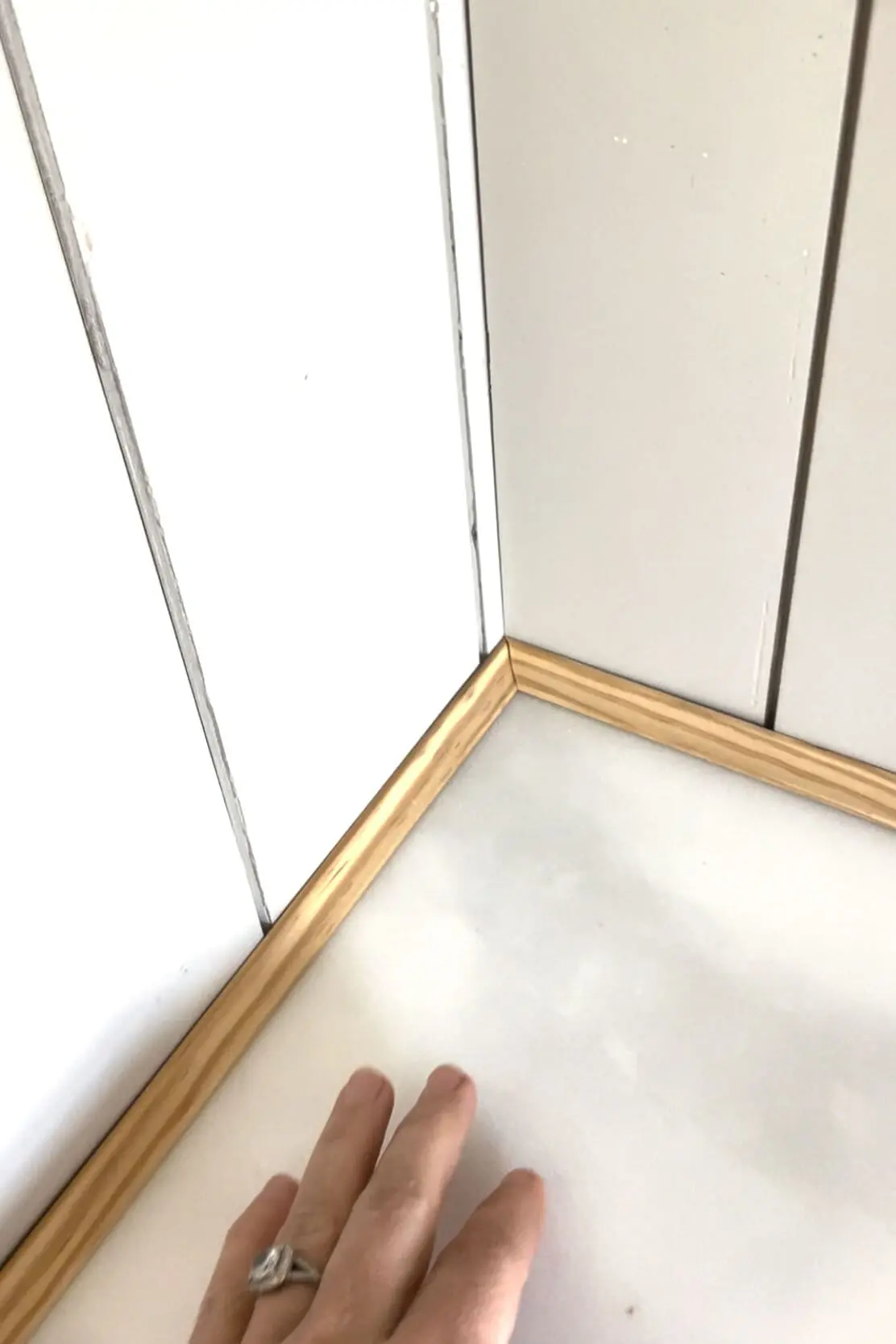 Using shoe molding with a shiplap backsplash.